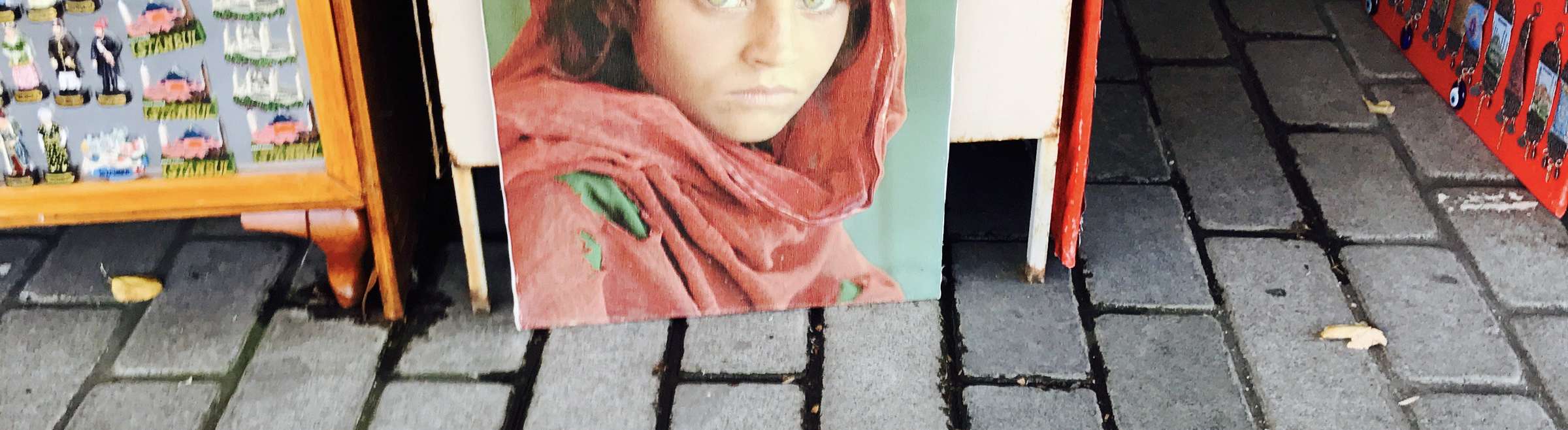 THE GREEN EYED AFGHAN GIRL